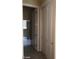 Hallway with access to storage and bathroom at 2175 Clearwater Lake Dr, Henderson, NV 89044