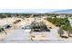 Aerial view of a home showcasing its spacious surroundings and proximity to the street at 2251 Bridger St, Pahrump, NV 89048