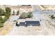 An aerial view of a home with solar panels and a desert landscape at 2251 Bridger St, Pahrump, NV 89048