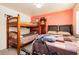 Bedroom features a full bed, a twin bunk bed, and a matching twin bed at 2251 Bridger St, Pahrump, NV 89048