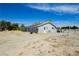 Single story home with solar panels and large lot in desert landscape at 2251 Bridger St, Pahrump, NV 89048
