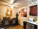 Inviting dining area next to the kitchen, illuminated by a modern ceiling light at 2451 N Rainbow Blvd # 2073, Las Vegas, NV 89108