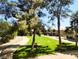 Community area featuring lush trees and a picnic area with a BBQ grill at 2451 N Rainbow Blvd # 2073, Las Vegas, NV 89108