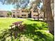 Community area with picnic table and grill on a grassy lawn at 2451 N Rainbow Blvd # 2073, Las Vegas, NV 89108