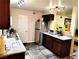 Efficient kitchen featuring stainless steel refrigerator and ample cabinet space at 2451 N Rainbow Blvd # 2073, Las Vegas, NV 89108
