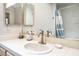 Bathroom vanity with updated faucet, mirror, and tile countertops at 2851 S Valley View Blvd # 1071, Las Vegas, NV 89102