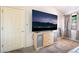 Bedroom featuring a large screen TV, and a closet door at 2851 S Valley View Blvd # 1071, Las Vegas, NV 89102