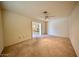 Spacious bedroom with carpeted floors and view to another room at 2851 S Valley View Blvd # 1199, Las Vegas, NV 89102