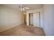 Comfortable bedroom showcasing plush carpeting, a ceiling fan, and a closet with sliding doors at 2851 S Valley View Blvd # 1199, Las Vegas, NV 89102
