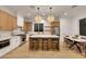 Modern kitchen featuring a large island, stainless steel appliances, and stylish pendant lighting at 2921 Guillemot Ave, North Las Vegas, NV 89084