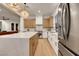 Modern kitchen with spacious island, stainless steel appliances, and contemporary finishes at 2921 Guillemot Ave, North Las Vegas, NV 89084