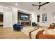 Stylish living room features fireplace, comfortable seating, modern design, and plenty of natural light at 2921 Guillemot Ave, North Las Vegas, NV 89084