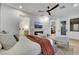 Bright bedroom with a ceiling fan, stylish décor, and views of multiple rooms in the home at 2921 Guillemot Ave, North Las Vegas, NV 89084