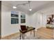 Bright office featuring a desk, chair, and natural light with wood look flooring at 2921 Guillemot Ave, North Las Vegas, NV 89084