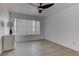 Bright bedroom with wood-look floors, white walls, and a cabinet at 3103 Key Largo Dr # 103, Las Vegas, NV 89120