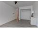 Open bedroom with a ceiling fan, closet, and wood-look floors at 3103 Key Largo Dr # 103, Las Vegas, NV 89120