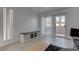 Bright living room featuring modern furniture and a sliding glass door at 3103 Key Largo Dr # 103, Las Vegas, NV 89120