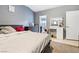 Comfortable bedroom with carpeted floors, vanity, and natural light at 320 W Van Buren Ave, Las Vegas, NV 89106