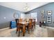 Casual dining area showcasing a wooden table with seating for six and natural light at 320 W Van Buren Ave, Las Vegas, NV 89106