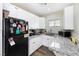 Kitchen with sleek cabinets, countertops, and modern appliances. Perfect for any culinary adventure at 320 W Van Buren Ave, Las Vegas, NV 89106
