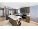 Well-appointed kitchen featuring stainless steel appliances, custom cabinets, and a center island with countertop seating at 320 W Van Buren Ave, Las Vegas, NV 89106