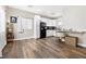 Spacious kitchen featuring sleek cabinets, countertops, complemented by hardwood flooring at 320 W Van Buren Ave, Las Vegas, NV 89106