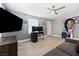 Neutral living area featuring wood floors, modern furniture, and ample lighting for a comfortable atmosphere at 320 W Van Buren Ave, Las Vegas, NV 89106