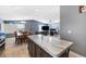 Bright living room features a dining area, modern furniture, and an inviting, spacious atmosphere at 320 W Van Buren Ave, Las Vegas, NV 89106