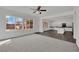 Spacious living room boasts ample natural light and a seamless transition to the outdoors, great for entertaining at 3221 Birdwatcher Ave, North Las Vegas, NV 89084
