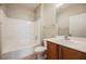 Bathroom featuring a shower and bathtub combination and wood vanity at 3405 Kingbird Dr, North Las Vegas, NV 89084