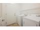 Laundry room featuring a white washer and dryer at 3405 Kingbird Dr, North Las Vegas, NV 89084