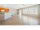 Open floor plan featuring tile flooring, natural light from large windows, and access to the outdoor patio at 3405 Kingbird Dr, North Las Vegas, NV 89084