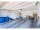 Spacious two car garage featuring ample storage space and high ceilings at 4376 Latitude Valley Ct, North Las Vegas, NV 89084
