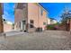 Backyard features a stucco wall and space for outdoor activities at 439 Royal Bridge Dr, Las Vegas, NV 89178
