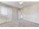 Neutral bedroom with plush carpeting and sliding closet doors at 439 Royal Bridge Dr, Las Vegas, NV 89178