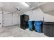 Spacious garage with ample storage, utility connections and overhead lighting at 439 Royal Bridge Dr, Las Vegas, NV 89178