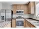 This modern kitchen showcases stainless steel appliances and ample countertop space at 439 Royal Bridge Dr, Las Vegas, NV 89178