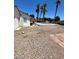 Backyard with a view of the pool and patio, perfect for relaxation and recreation at 45 Logan Ct, Las Vegas, NV 89110