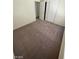 Bedroom featuring carpet flooring, door, sliding closet door and ample lighting at 45 Logan Ct, Las Vegas, NV 89110
