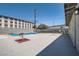 Backyard with a pool, concrete patio, and mature landscaping at 4558 Sheppard Dr, Las Vegas, NV 89122
