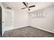 Bright bedroom features new carpet and access to bathroom and kitchen at 4558 Sheppard Dr, Las Vegas, NV 89122