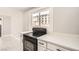 Modern kitchen with white countertops and new appliances at 4558 Sheppard Dr, Las Vegas, NV 89122