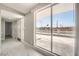 Bright living room showcases a spacious floor plan with light paint colors and marble-style floors at 4558 Sheppard Dr, Las Vegas, NV 89122