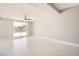 Bright and spacious living room with tile flooring and modern fixtures at 4558 Sheppard Dr, Las Vegas, NV 89122