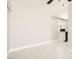 Bright living room features white tile flooring and access to the kitchen at 4558 Sheppard Dr, Las Vegas, NV 89122