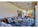 Comfortable, covered patio area perfect for relaxation and gatherings, featuring comfortable seating at 4615 Stearman Dr, North Las Vegas, NV 89031