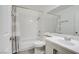 Bathroom with a shower and tub combination, a gray and white curtain, and single vanity at 4615 Stearman Dr, North Las Vegas, NV 89031