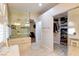 Well-lit bathroom featuring a glass shower, tile floors, and access to walk-in closet at 4615 Stearman Dr, North Las Vegas, NV 89031