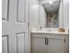 Bathroom featuring a white vanity, drawers and a mirrored wall at 4615 Stearman Dr, North Las Vegas, NV 89031