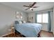 Bedroom with a large window and stylish decor at 4615 Stearman Dr, North Las Vegas, NV 89031